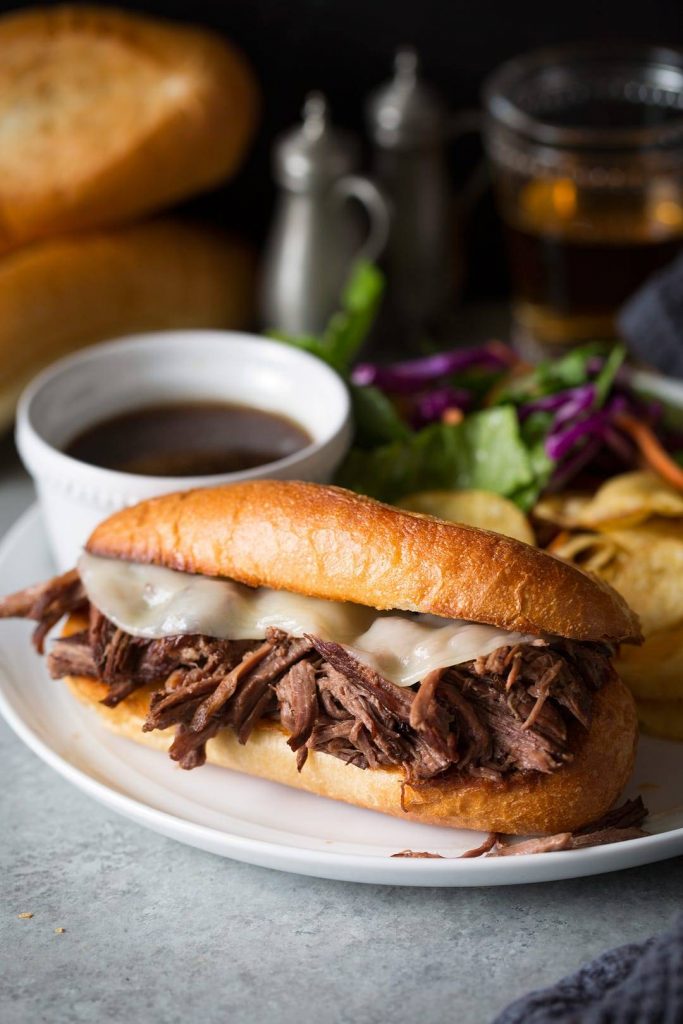 Slow Cooker French Dip Sandwiches 2024 | American, Appetizer, Beef Recipes, Dinner, Featured, Main Meals, RECIPES, Trending, Worldly Faves