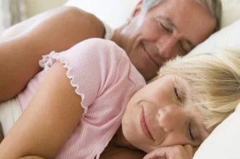 After nearly 50 years of marriage, a couple was lying in bed one evening, when the wife felt her husband..