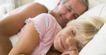 After nearly 50 years of marriage, a couple was lying in bed one evening, when the wife felt her husband..
